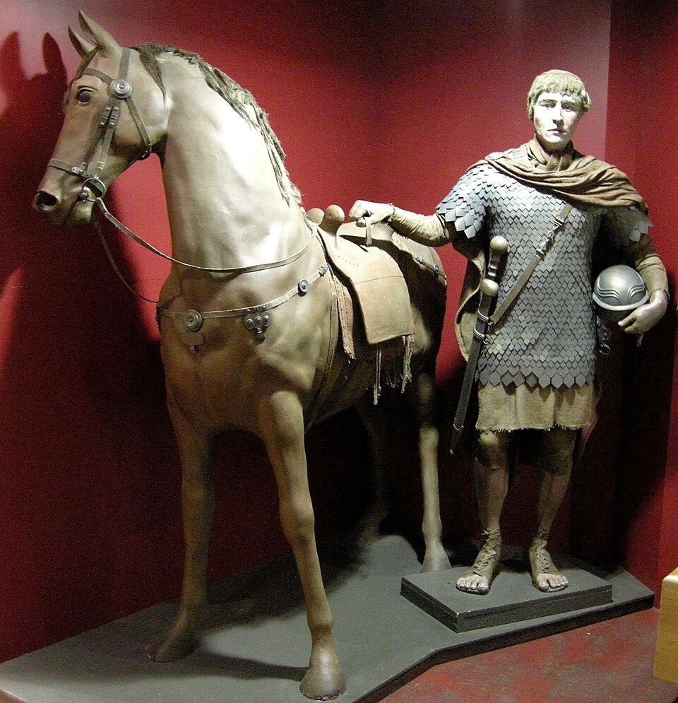 A relief carving depicting a Roman horse and rider, representative of the kind of political prominence Caligula allegedly planned for his horse Incitatus