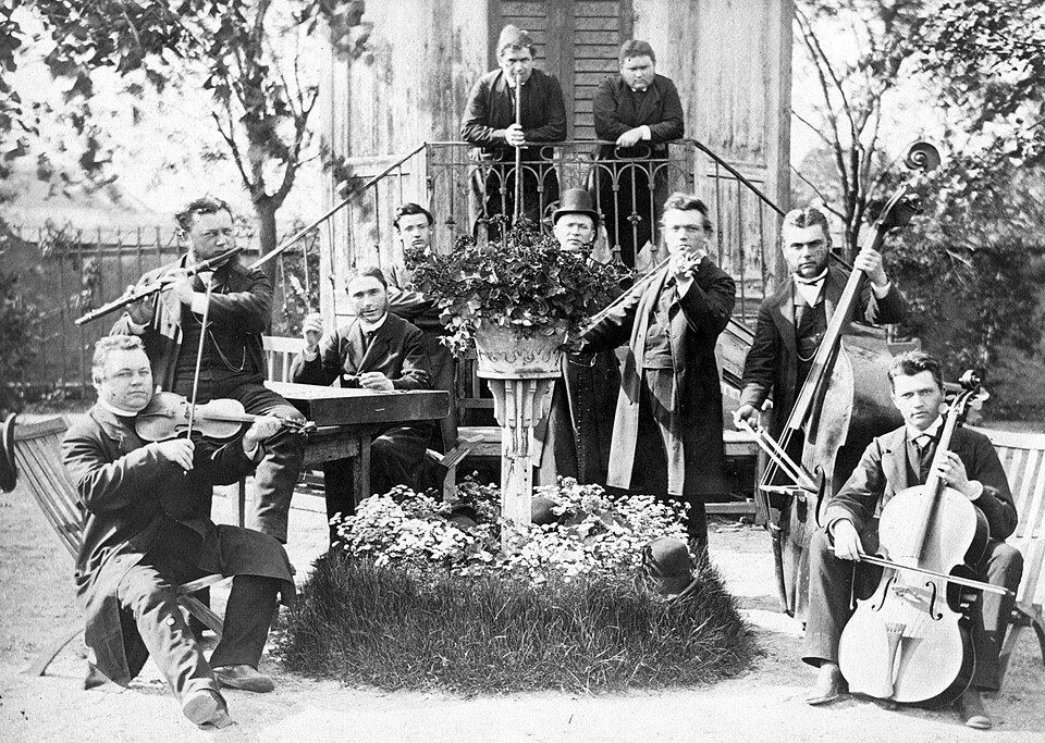 A collection of classical instruments including cello and violin, objects whose relationship with commercial aviation has generated a disproportionate amount of paperwork
