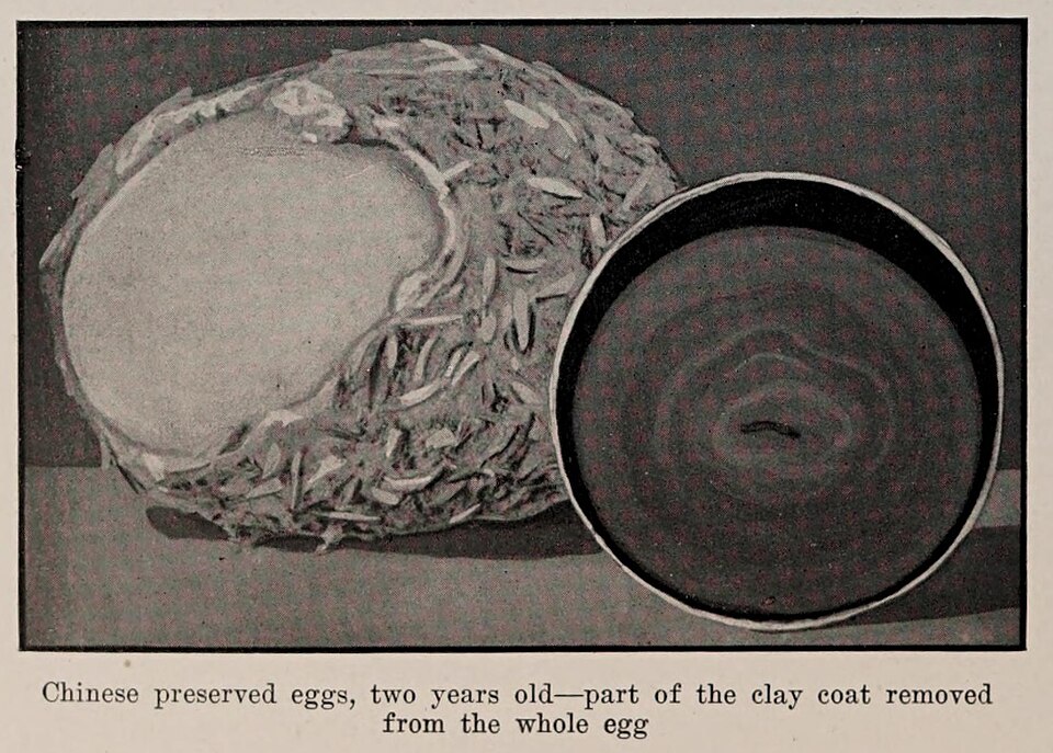 A century egg or pidan, a Chinese preserved duck egg with translucent dark brown white and grey-green yolk