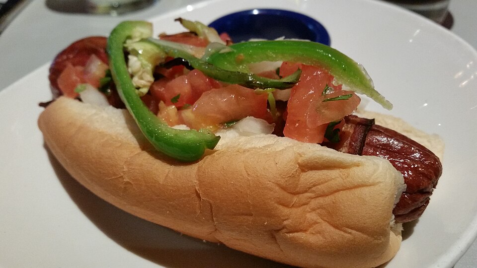 A plate of hot dogs, the food at the center of competitive eating's most famous world record