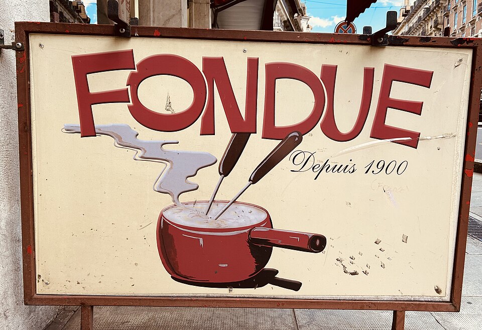Swiss fondue restaurant where service is included in the bill and tipping is uncommon