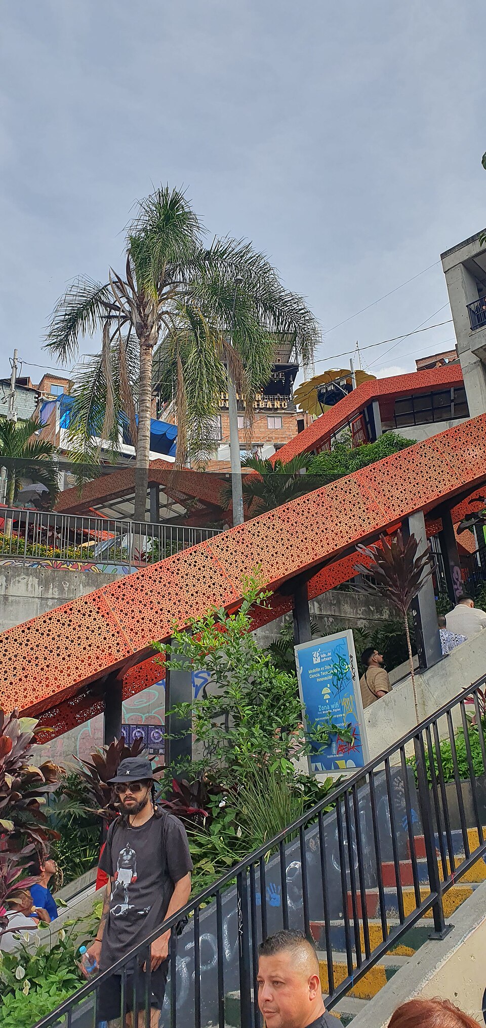 The outdoor escalators climbing through the hillside neighbourhood of Comuna 13 in Medellin, Colombia
