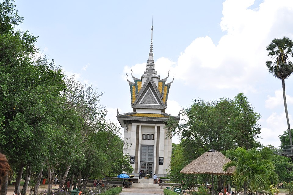 The Buddhist memorial stupa at Choeung Ek killing fields containing thousands of human skulls, near Phnom Penh
