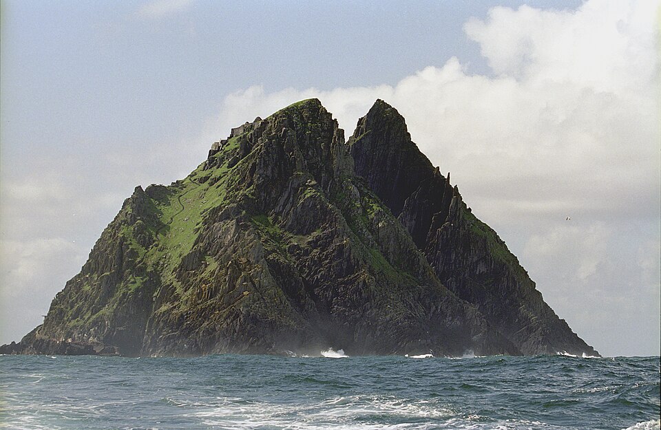 The stone beehive huts of Skellig Michael monastery on a rocky Atlantic island off Ireland