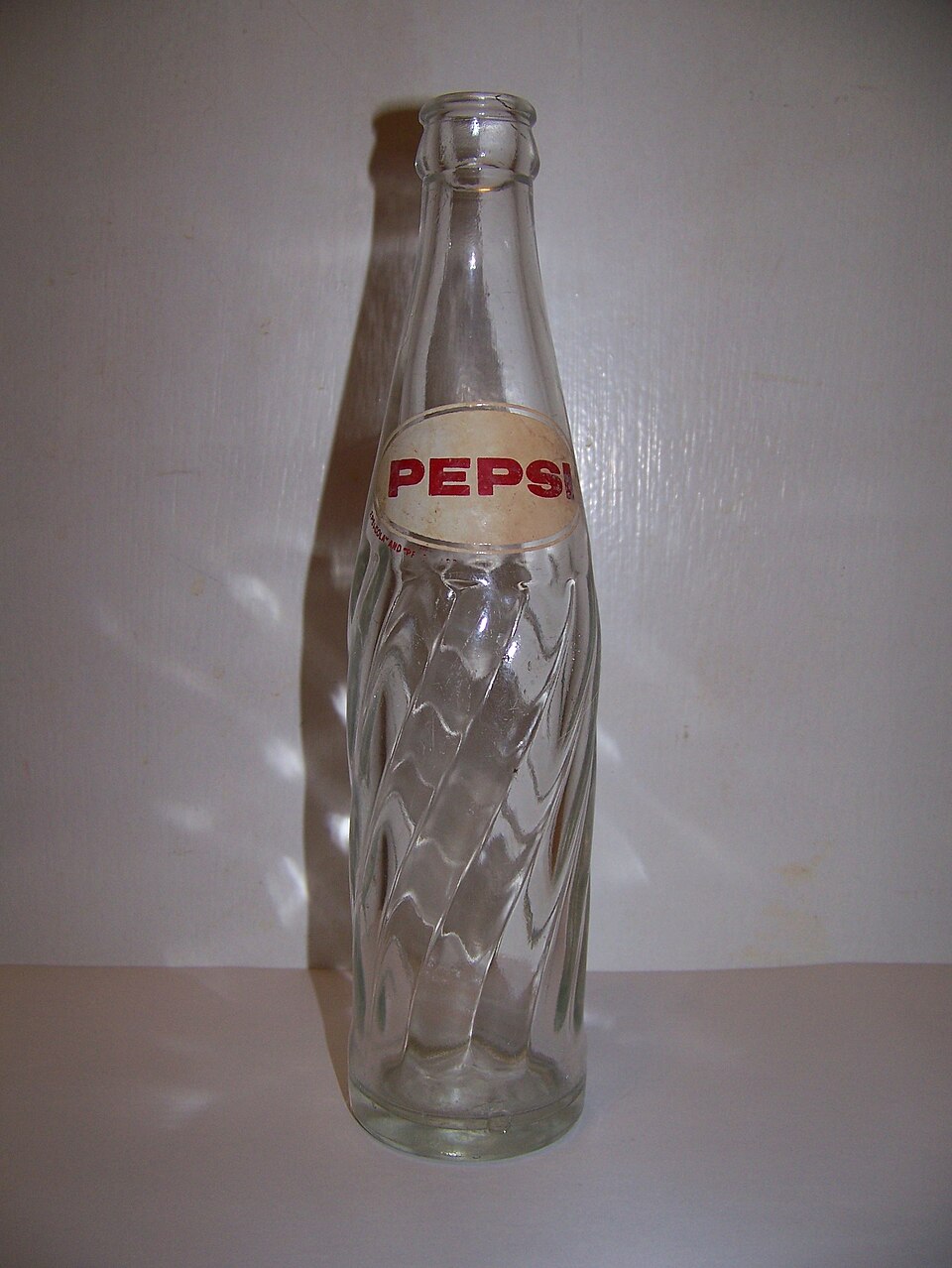 A vintage Pepsi-Cola bottle from the era when the drink was marketed as a digestive aid