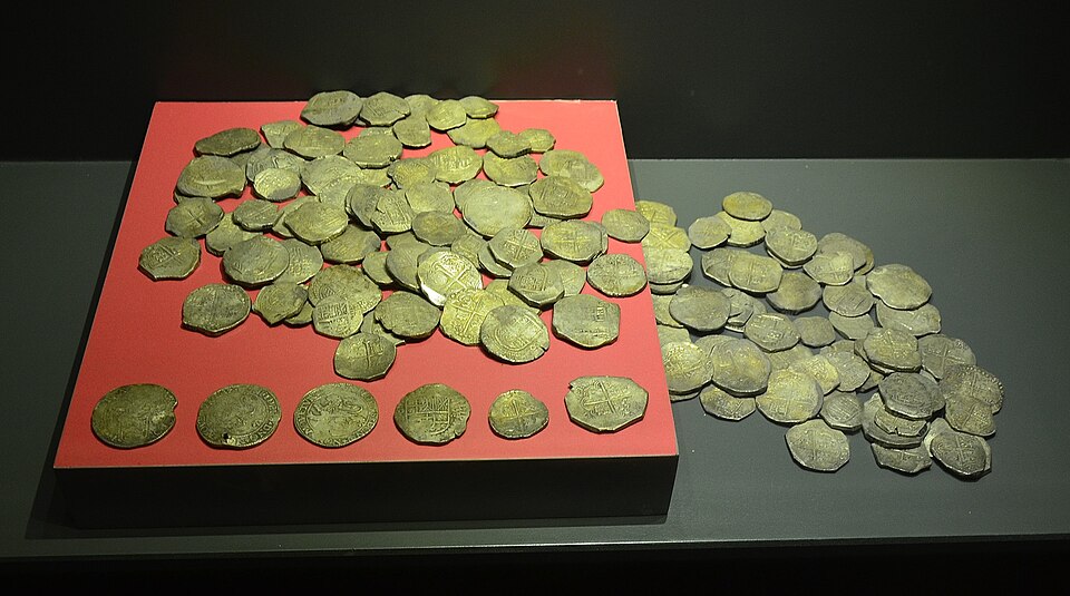 Ancient coins at an archaeological museum - the kind that belongs in a display case, not your carry-on luggage