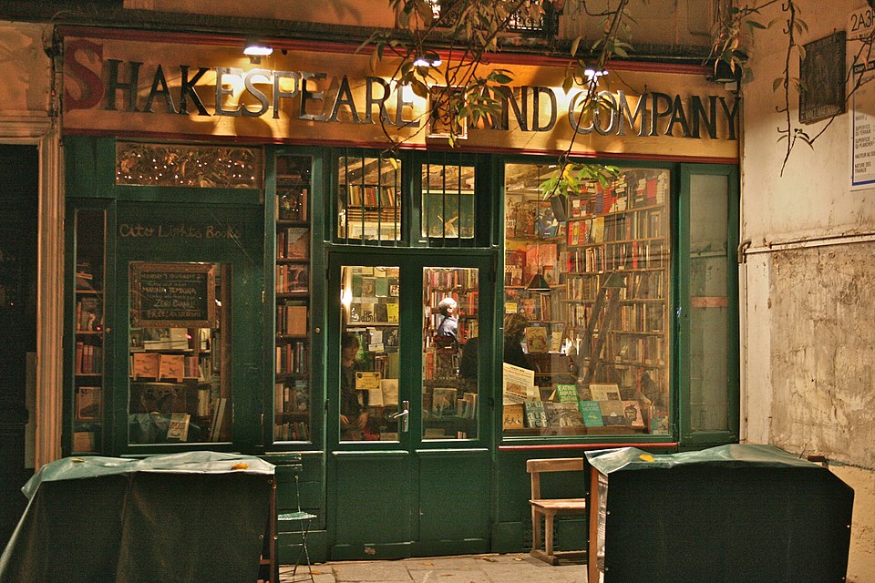 Shakespeare and Company bookshop in Paris with its green facade and outdoor book stalls