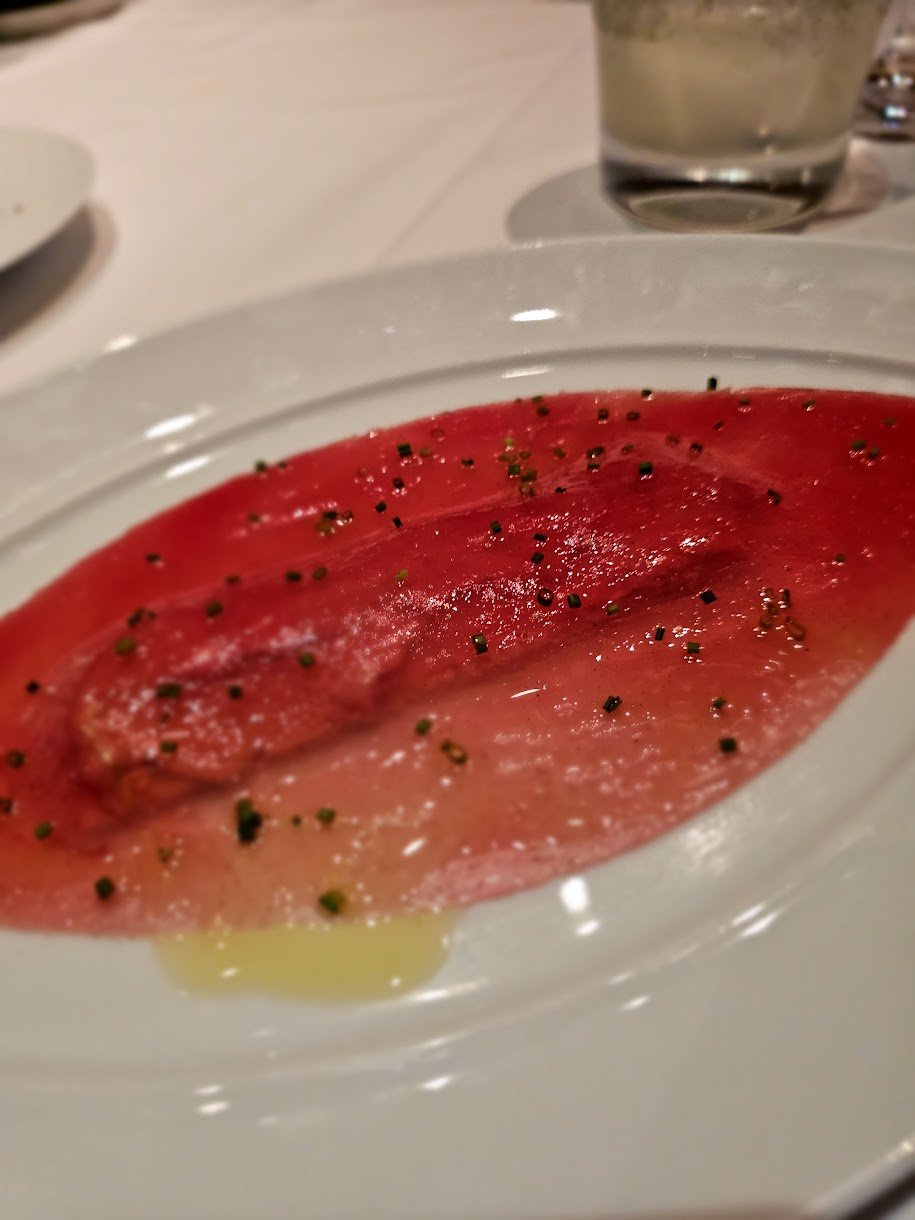 A plated slice of foie gras terrine