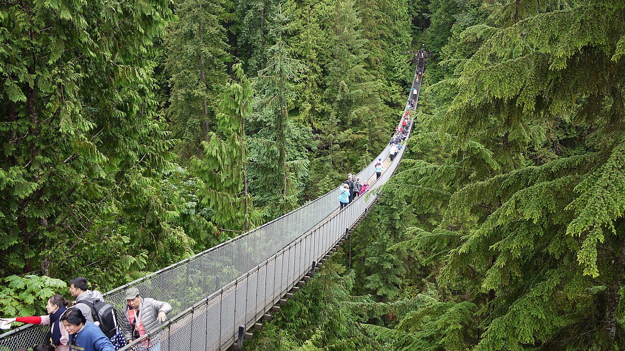 The Capilano Suspension Bridge stretching high above a forested river gorge near Vancouver, Canada