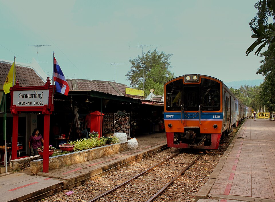 Thai railway train at the River Kwai Bridge, Kanchanaburi - part of the historic Death Railway