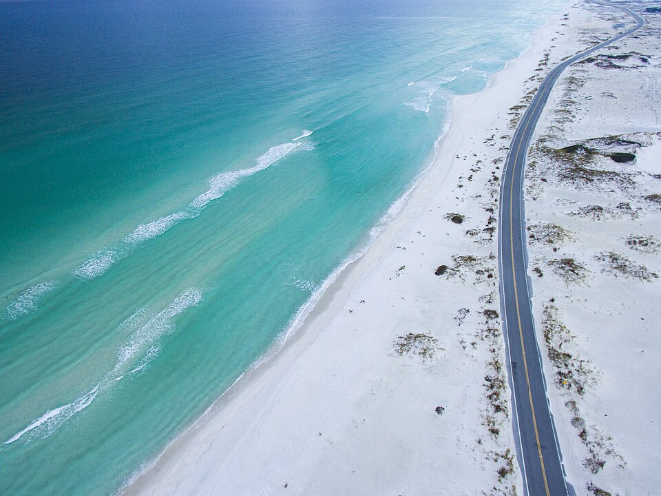 An empty beach meeting the ocean, the timeless backdrop for humanity's most unusual lost-and-found operation