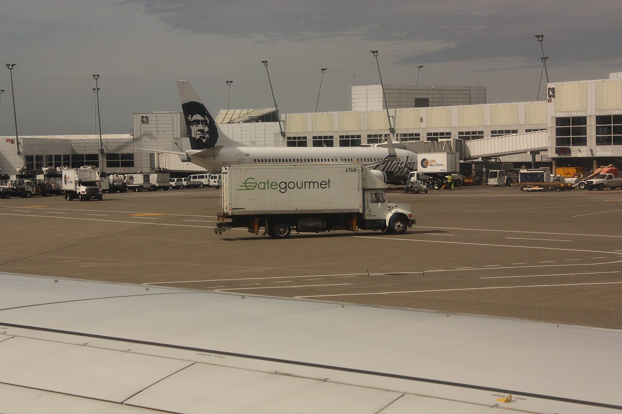 Gate Gourmet airline catering kitchen with stainless steel equipment - global airline catering operations like this produce hundreds of thousands of meals per day