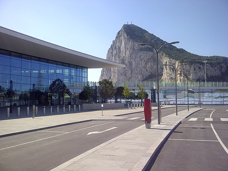 Gibraltar Airport terminal and road crossing runway